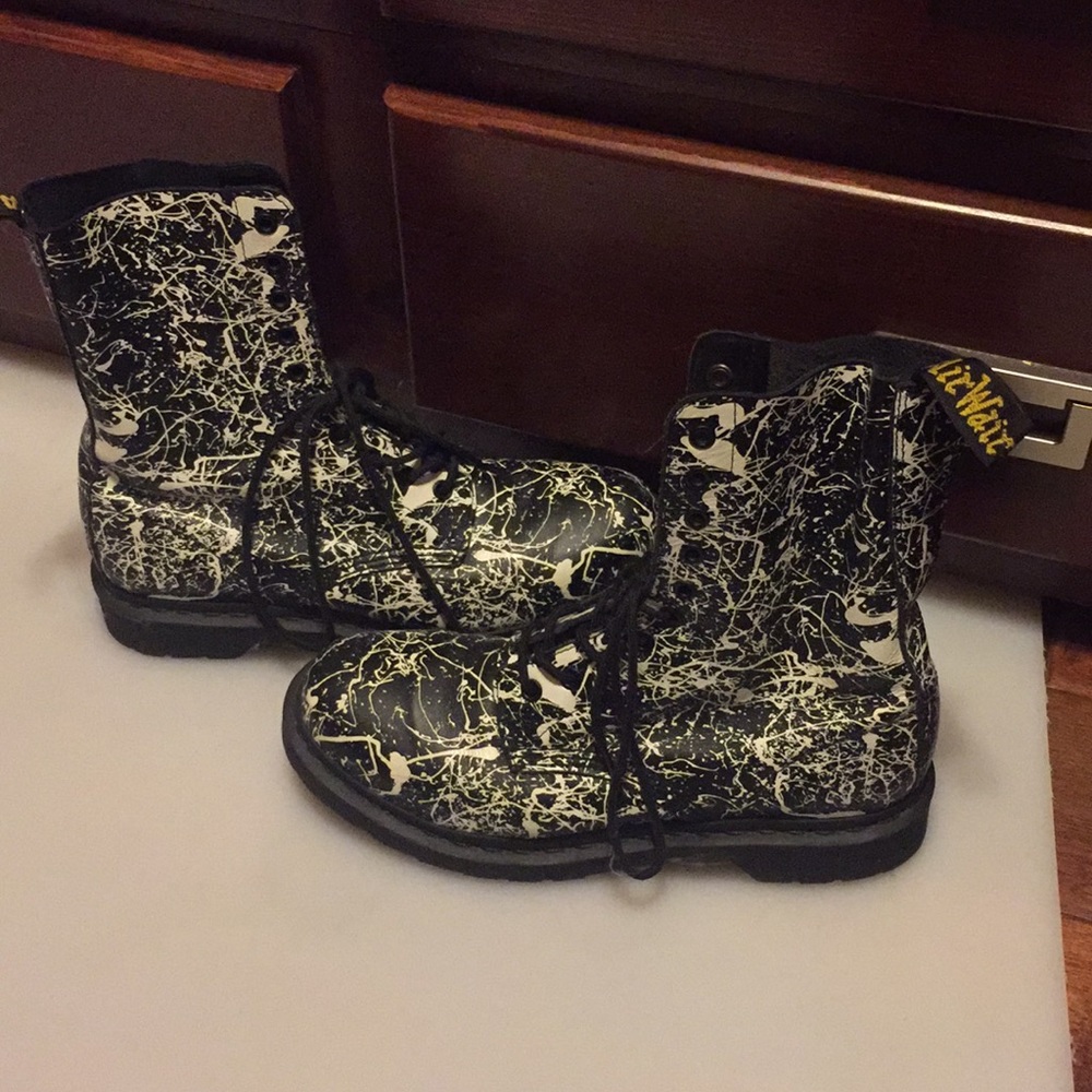 Paint splattered Dr. Marten’s Women’s size 10.